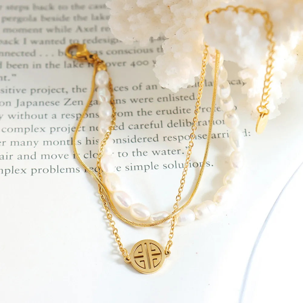 Titanium steel three-layer pearl bracelet, lightweight luxury high-end